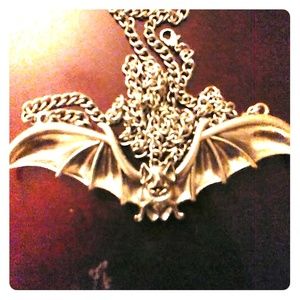 Silver steel bat necklace